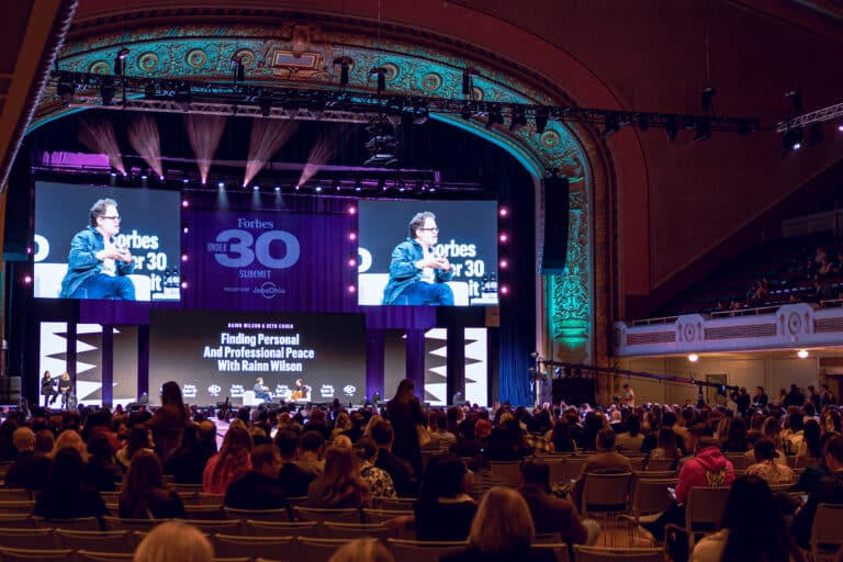 Forbes Under 30 Summit stage with Rainn Wilson presenting