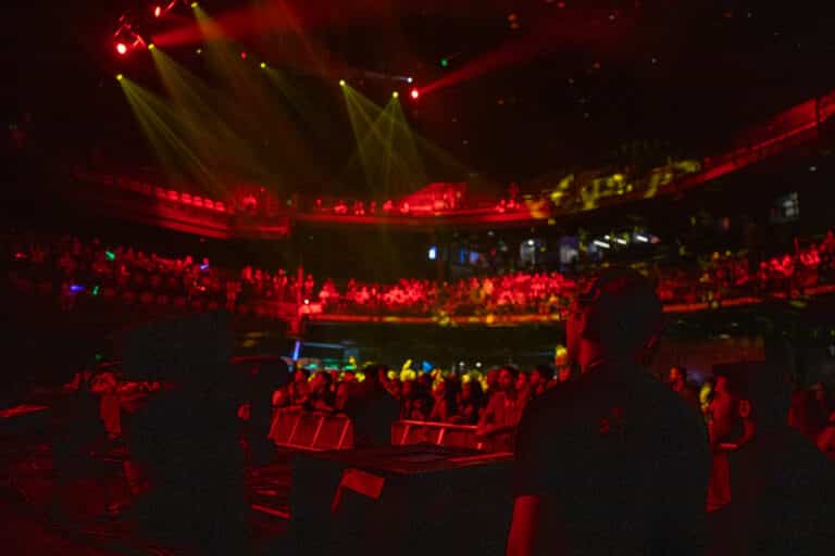 Red lighting on audience members