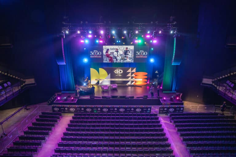 Forbes Under 30 Summit multicolored stage overhead view with seating