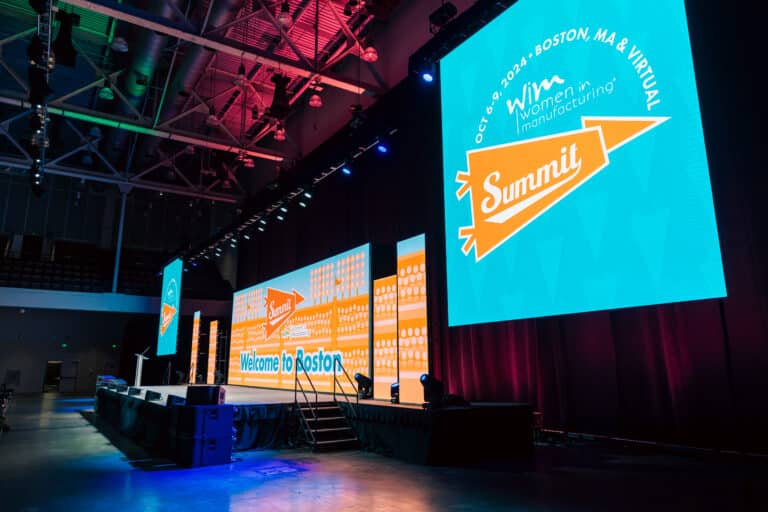 Women in Manufacturing stage from side stage